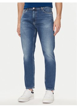 Tommy Jeans Jeansy DM0DM18765 Niebieski Tapered Fit ze sklepu MODIVO w kategorii Jeansy męskie - zdjęcie 182638672