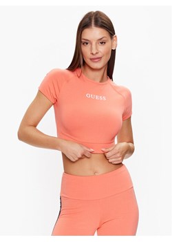 Guess Top V3RP16 KABR0 Pomarańczowy Slim Fit ze sklepu MODIVO w kategorii Bluzki damskie - zdjęcie 182639370