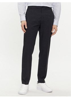 Tommy Hilfiger Chinosy Chelsea MW0MW33933 Granatowy Slim Fit ze sklepu MODIVO w kategorii Spodnie męskie - zdjęcie 182641163