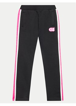 Guess Spodnie dresowe J4YQ12 KA6R4 Czarny Relaxed Fit - id: 0000303925871 - marki Guess - 182642221 Guess Spodnie dresowe J4YQ12 KA6R4 Czarny Relaxed Fit ze sklepu MODIVO w kategorii Spodnie chłopięce - zdjęcie 182642221