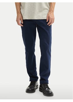Tom Tailor Spodnie materiałowe 1044398 Granatowy Slim Fit ze sklepu MODIVO w kategorii Spodnie męskie - zdjęcie 182642433