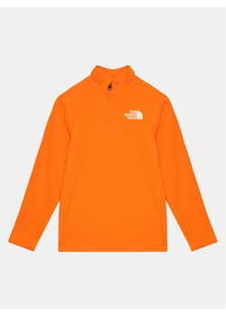 The North Face Polar Glacier NF0A8AZM Pomarańczowy Regular Fit ze sklepu MODIVO w kategorii Bluzy chłopięce - zdjęcie 182643452