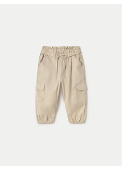 Mayoral Joggery 1571 Beżowy Relaxed Fit ze sklepu MODIVO w kategorii Spodnie i półśpiochy - zdjęcie 182643603