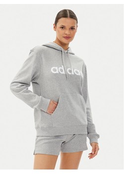adidas Bluza Essentials Linear Hoodie IC6884 Szary Regular Fit ze sklepu MODIVO w kategorii Bluzy damskie - zdjęcie 182644003