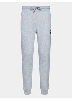 Le Coq Sportif Spodnie dresowe 2310346 Szary Slim Fit - id: 0000303335816 - marki Le Coq Sportif - 182645592 Le Coq Sportif Spodnie dresowe 2310346 Szary Slim Fit ze sklepu MODIVO w kategorii Spodnie męskie - zdjęcie 182645592