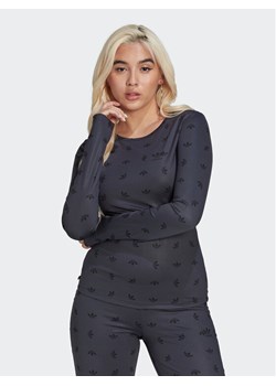 adidas Bluzka Allover Print HL9137 Czarny Slim Fit ze sklepu MODIVO w kategorii Bluzki damskie - zdjęcie 182646111
