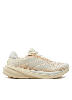 adidas Buty do biegania Supernova Stride 2 IH8651 Beżowy ze sklepu MODIVO w kategorii Buty sportowe damskie - zdjęcie 182646830