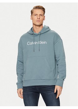Calvin Klein Bluza Hero Logo Comfort Hoodie K10K111345 Niebieski Regular Fit ze sklepu MODIVO w kategorii Bluzy męskie - zdjęcie 182647731