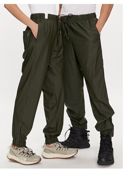Rains Spodnie przeciwdeszczowe Rain Pants Regular W3 18560 Zielony Regular Fit ze sklepu MODIVO w kategorii Spodnie damskie - zdjęcie 182648574