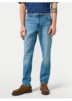 Wrangler Jeansy River 112356836 Niebieski Tapered Fit ze sklepu MODIVO w kategorii Jeansy męskie - zdjęcie 182649392