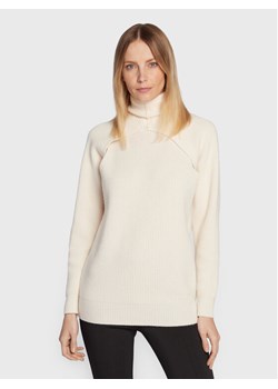 Calvin Klein Golf K20K205092 Écru Relaxed Fit ze sklepu MODIVO w kategorii Swetry damskie - zdjęcie 182649523
