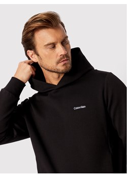 Calvin Klein Bluza Micro Logo K10K109927 Czarny Relaxed Fit ze sklepu MODIVO w kategorii Bluzy męskie - zdjęcie 182649802