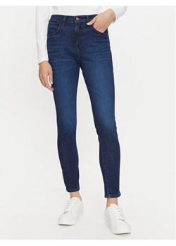 Wrangler Jeansy 112358235 Granatowy Skinny Fit ze sklepu MODIVO w kategorii Jeansy damskie - zdjęcie 182649824