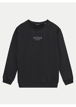 Guess Bluza L4BQ28 KAV33 Czarny Regular Fit ze sklepu MODIVO w kategorii Bluzy chłopięce - zdjęcie 182650513