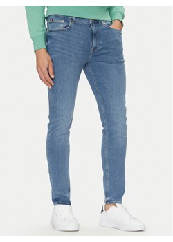 Tommy Hilfiger Jeansy Bleecker MW0MW38823 Niebieski Slim Fit ze sklepu MODIVO w kategorii Jeansy męskie - zdjęcie 182652993
