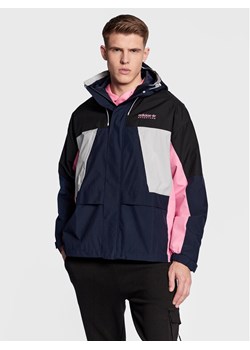 adidas Kurtka przejściowa Adventure Ride HK4980 Granatowy Loose Fit ze sklepu MODIVO w kategorii Kurtki męskie - zdjęcie 182653622