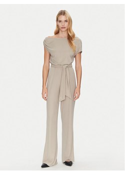 Guess Kombinezon W5GD89 KCTB0 Beżowy Regular Fit ze sklepu MODIVO w kategorii Kombinezony damskie - zdjęcie 182654103