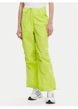 adidas by Stella McCartney Spodnie dresowe Stella McCartney Woven JG5783 Zielony Loose Fit ze sklepu MODIVO w kategorii Spodnie damskie - zdjęcie 182654603