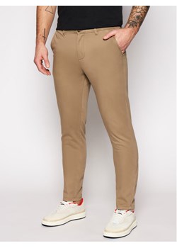 Jack&Jones Chinosy Marco Bowie 12150160 Beżowy Slim Fit ze sklepu MODIVO w kategorii Spodnie męskie - zdjęcie 182654792