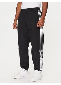 adidas Spodnie dresowe Adibreak JD4257 Czarny Loose Fit ze sklepu MODIVO w kategorii Spodnie męskie - zdjęcie 182655414