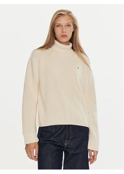 Tommy Hilfiger Golf WW0WW43094 Écru Regular Fit ze sklepu MODIVO w kategorii Swetry damskie - zdjęcie 182656372