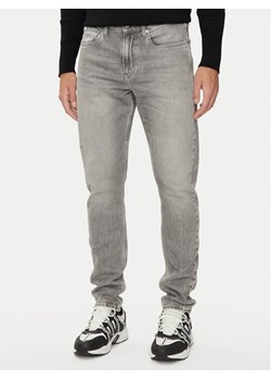 Calvin Klein Jeans Jeansy J30J324833 Szary Slim Fit ze sklepu MODIVO w kategorii Jeansy męskie - zdjęcie 182656793