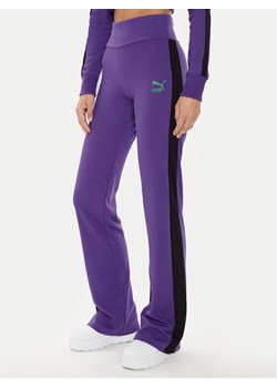 Puma Spodnie dresowe DUA LIPA 536629 Fioletowy Slim Fit ze sklepu MODIVO w kategorii Spodnie damskie - zdjęcie 182657031