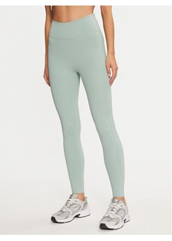 4F Legginsy 4FWAW24TFTIF283 Zielony Slim Fit ze sklepu MODIVO w kategorii Spodnie damskie - zdjęcie 182658111