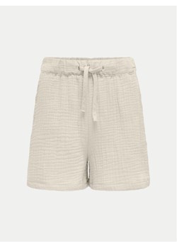 Kids ONLY Szorty materiałowe Thyra 15293680 Beżowy Regular Fit ze sklepu MODIVO w kategorii Spodenki dziewczęce - zdjęcie 182660602