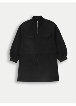 Coccodrillo Sukienka dzianinowa ZC4129101CGJ Czarny Regular Fit ze sklepu MODIVO w kategorii Sukienki dziewczęce - zdjęcie 182662343