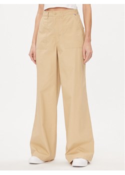 Tommy Jeans Spodnie materiałowe Claire DW0DW17314 Beżowy Wide Leg ze sklepu MODIVO w kategorii Spodnie damskie - zdjęcie 182663864