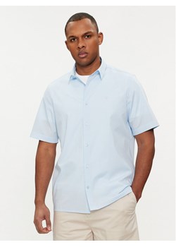 Calvin Klein Koszula K10K109440 Błękitny Regular Fit ze sklepu MODIVO w kategorii Koszule męskie - zdjęcie 182664593