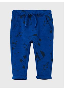 OVS Spodnie dresowe 1582450 Granatowy Regular Fit ze sklepu MODIVO w kategorii Spodnie chłopięce - zdjęcie 182664891