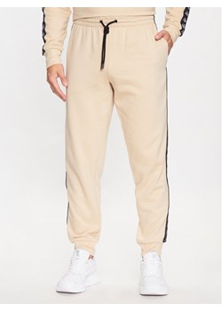 Kappa Spodnie dresowe 313014 Brązowy Regular Fit ze sklepu MODIVO w kategorii Spodnie męskie - zdjęcie 182665182