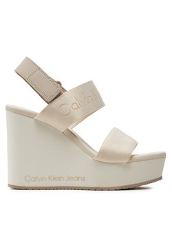 Calvin Klein Jeans Sandały Wedge Sandal Webbing In Mtl YW0YW01479 Écru ze sklepu MODIVO w kategorii Sandały damskie - zdjęcie 182665441