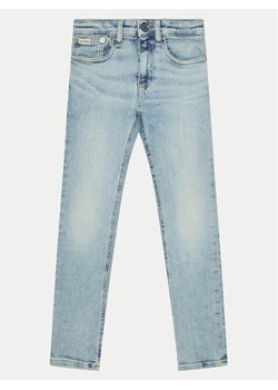 Calvin Klein Jeans Jeansy IB0IB02304 Niebieski Slim Fit ze sklepu MODIVO w kategorii Spodnie dziewczęce - zdjęcie 182665841