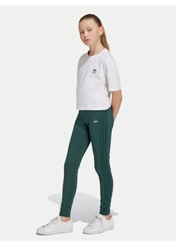 adidas Legginsy IY9542 Zielony Slim Fit ze sklepu MODIVO w kategorii Spodnie dziewczęce - zdjęcie 182667283