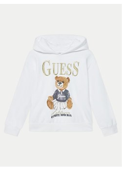 Guess Bluza J5RQ04 KAD74 Biały Regular Fit ze sklepu MODIVO w kategorii Bluzy dziewczęce - zdjęcie 182667792