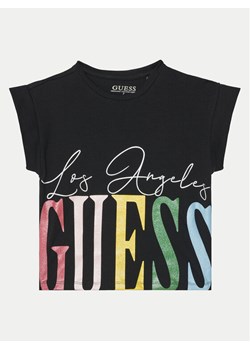 Guess T-Shirt J5RI00 K6YW4 Czarny Boxy Fit ze sklepu MODIVO w kategorii T-shirty chłopięce - zdjęcie 182667864