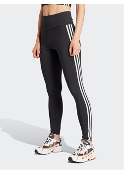 adidas Legginsy 3-Stripes IP2968 Czarny Slim Fit ze sklepu MODIVO w kategorii Spodnie damskie - zdjęcie 182669283