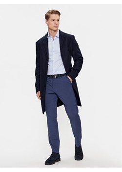Calvin Klein Płaszcz wełniany K10K110462 Granatowy Regular Fit ze sklepu MODIVO w kategorii Płaszcze męskie - zdjęcie 182669510