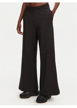 HUGO Spodnie dresowe Nalosia 50530447 Czarny Loose Fit ze sklepu MODIVO w kategorii Spodnie damskie - zdjęcie 182669654