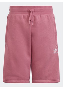 adidas Szorty sportowe Adicolor Shorts IC3173 Różowy Regular Fit ze sklepu MODIVO w kategorii Spodenki dziewczęce - zdjęcie 182669720