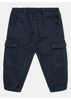 OVS Spodnie materiałowe 2099375 Niebieski Regular Fit ze sklepu MODIVO w kategorii Spodnie i półśpiochy - zdjęcie 182671832