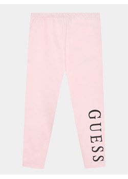 Guess Legginsy J93B11 K82K0 Różowy Slim Fit ze sklepu MODIVO w kategorii Spodnie dziewczęce - zdjęcie 182672971