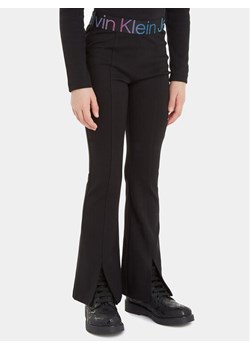 Calvin Klein Jeans Legginsy IG0IG02179 Czarny Slim Fit ze sklepu MODIVO w kategorii Spodnie dziewczęce - zdjęcie 182673234