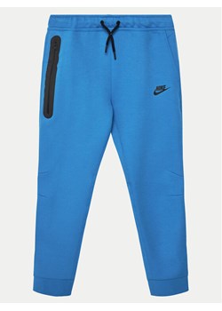 Nike Spodnie dresowe FD3287 Niebieski Standard Fit ze sklepu MODIVO w kategorii Spodnie chłopięce - zdjęcie 182673842