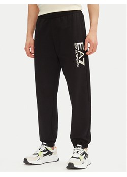 EA7 Emporio Armani Spodnie dresowe 7M000233 AF13512 MC156 Czarny Regular Fit ze sklepu MODIVO w kategorii Spodnie męskie - zdjęcie 182674074