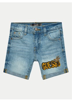 Guess Szorty jeansowe N4GD17 D41E0 Niebieski Regular Fit ze sklepu MODIVO w kategorii Spodenki chłopięce - zdjęcie 182674573
