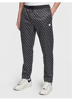 Guess Spodnie dresowe Korbin Z2BB05 FL04Q Czarny Regular Fit ze sklepu MODIVO w kategorii Spodnie męskie - zdjęcie 182674894
